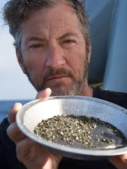 Darrell Miklos showing pyrite in his pan.