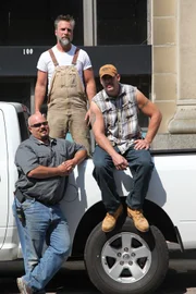 Jay, Mark and Dan pose in front of the bank in Oil City, PA.