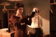 Nellie testing out her new gun.