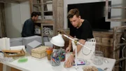 Nate & Jeremiah decorate the newly renovated office.
