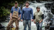Wes Richardson, Dustin Hurt and Carlos Minor stood in the creek.