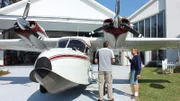 Michael Manousakis next to Grumman HU16.