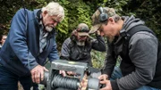 Kayla Sheets, Paul Richardson, Ryan Cardoza and Fred Hurt check over the broken winch.