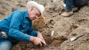 Mike Harris finding bones.