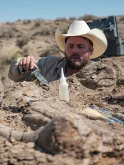 Aaron with knife looking for bones