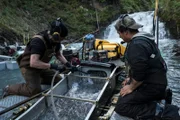 Wes Richardson and Carlos Minor check the sluice box.