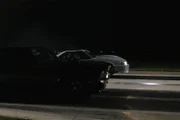 The Deathtrap catches air as Chuck guns it off the light.