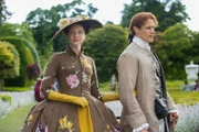 l-r: Claire Randall (Caitriona Balfe), Jamie Fraser (Sam Heughan)
