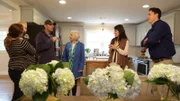 Potential buyers look on as Anita Corsini (Left) and Ken Corsini discuss the upgrades in their remodeled house on Flip or Flop Atlanta