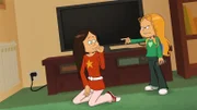 Marine befiehlt der hypnotisierten Wendy, die sich wie ein Baby verhält, nichts kaputt zu machen.