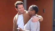 Nate Berkus listening to a helper of the Covenant House explain the current situation.