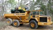 Mat purchases giant truck that has three axles and six wheels.