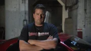 Shane Lester standing next to his car "Da Hellion".