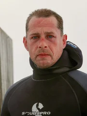 Captain Kris Kelly after a dive under the ice.