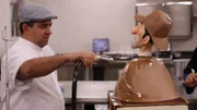 Buddy steams the finished Sherlock Holmes cake to give it a shiny look.