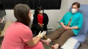 Dr. Sarah talking to Christine Bunting