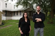 Hosts Katrina Weidman and Nick Groff stand in front of Malvern Manor.