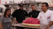 Buddy, Grace, Joe and Ralph look at the finished cake.