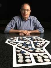 Gary Slutkin, Ph.D., Professor of Epidemiology at University of Illinois, Chicago prepares to demonstrate his studies.
