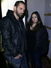 Hosts Nick Groff and Katrina Weidman standing in a doorway at Anderson Hotel.