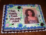 Photo of Barbara Winn on a cake