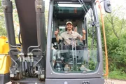 Tobi in excavator.