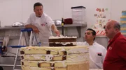 Buddy, Joey and Mauro carve the giant rubber ducky cake.