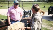 Warden Lauren Isles talking to the homeowner about turtle shell.