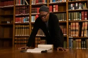 Enslaved - Auf den Spuren des Sklavenhandels EP Samuel L. Jackson looking over the "Abolition of the Slave Trade" Act from 1807 in the Parliamentary archives, House of Parliament in London, England.