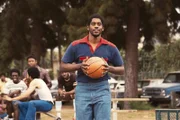 Quincy Isaiah as Magic Johnson