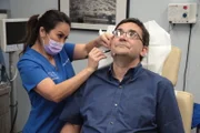 Dr. Lee marks up Lorne Nordstrom's face for the procedure.