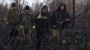 Tyson Len Kriska, H.A. Peters, Joey Zuray, and Patrick Erhart head back to their boat after killing a moose. They need to grab the right materials to properly quarter the moose.