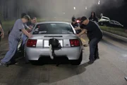 Brandon Smith's crew prepare him for his race against Shane Lester.