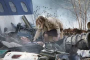 Frances Castledine (played by Hallie Seline) tries to help an injured passenger  from BEA Flight 548.
