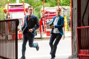 Pictured (L-R) Dr Dylan Reinhart (Alan Cumming), and Lizzie Needham (Bojana Novakovic)