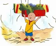 Caillou ist auf dem Hof von Jonas, dem Cowboy. Ausgelassen spielt er im Heu.