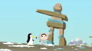 In der Nähe des Strandes haben Lissy und Inui eine große Steinfigur entdeckt. Sie fragen sich, warum die Figur dort hingebaut wurde.