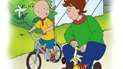 Um den traurigen Caillou wieder aufzumuntern, setzt sich Papi auf das Dreirad von Rosie. Ein lustiger Anblick.