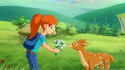 Zoe hat das perfekte Lockmittel für das Hirschkalb gefunden: Blumen.