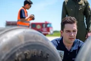 Brantford, Ontario, Canada - Investigator Echeverri (played by Isaiah Kolundzic) studies some debris from Aires Flight 8250. (Cineflix 2019/Darren Goldstein) Brantford, Ontario, Canada - Investigator Echeverri (played by Isaiah Kolundzic) studies some debris from Aires Flight 8250. (Cineflix 2019/Darren Goldstein)