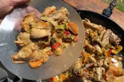 Pollo al Disco: eine traditionelle argentinische Spezialität