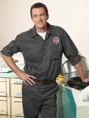 Der Hausmeister (Neil Flynn).