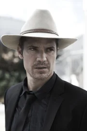 Timothy Olyphant as Raylan Givens.