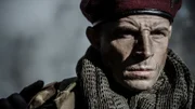 Oberstleutnant Derek, gespielt von Patrick Spencer.