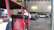 Car dealer Mike Wetzel survey the canvas for Living Color's next work of art.