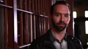 Host Nick Groff stands in a cell in the Old Chatham County Prison.