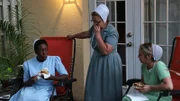 Shelly Yoder, Ada Byler, Dawn Martin eating burgers on the back patio.