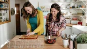 Host Molly Yeh, with her guest Anna Sather, assembling her Mini Rose Water Trifles with Cardamom Cream, as seen on Girl Meets Farm, Season 3.