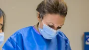 Close Up of Dr Emma in surgical clothing during Jennifer B's procedure