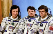 L-R: Die Mitglieder der Soyuz T-10 Weltraumbesatzung Oleg Atkov, Leonid Kizim und Vladimir Solovyev